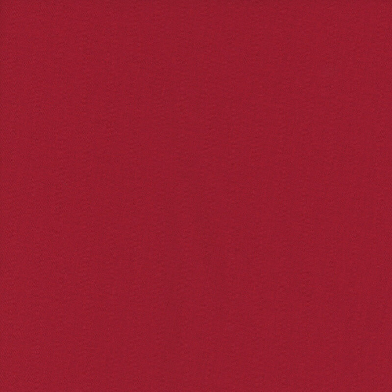 Photo of solid red backing fabric