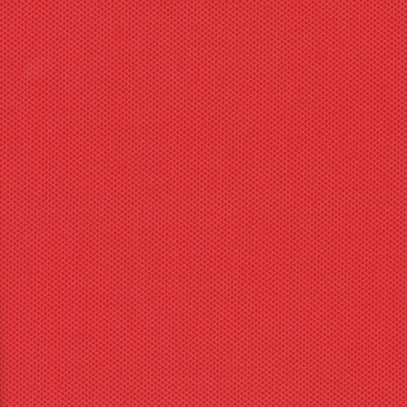 vibrant red fabric featuring a dotted halftone tonal print