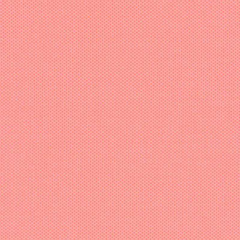 light coral fabric featuring a dotted halftone tonal print