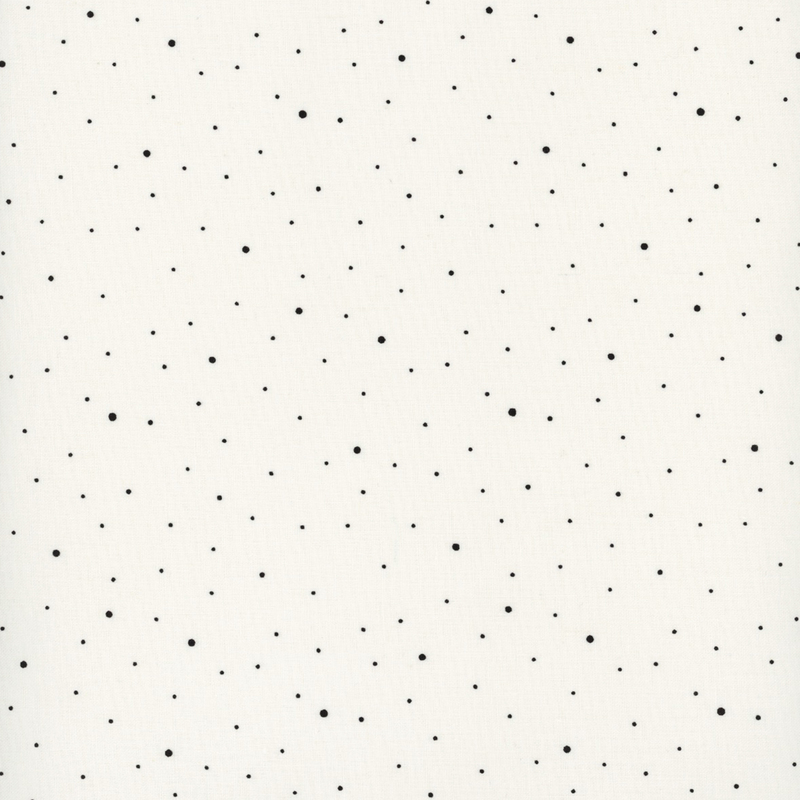 cream fabric with scattered small black dots