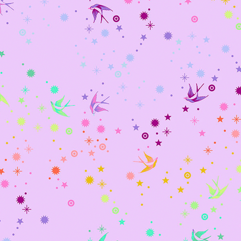 gorgeous light purple fabric with a lovely rainbow gradient of swallows, stars, and other little fairy dust motifs scattered across