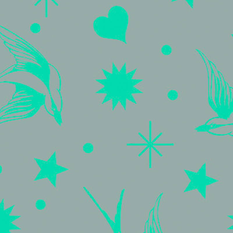 gorgeous cool gray fabric with neon teal swallows, stars, and other large sparkle motifs scattered across