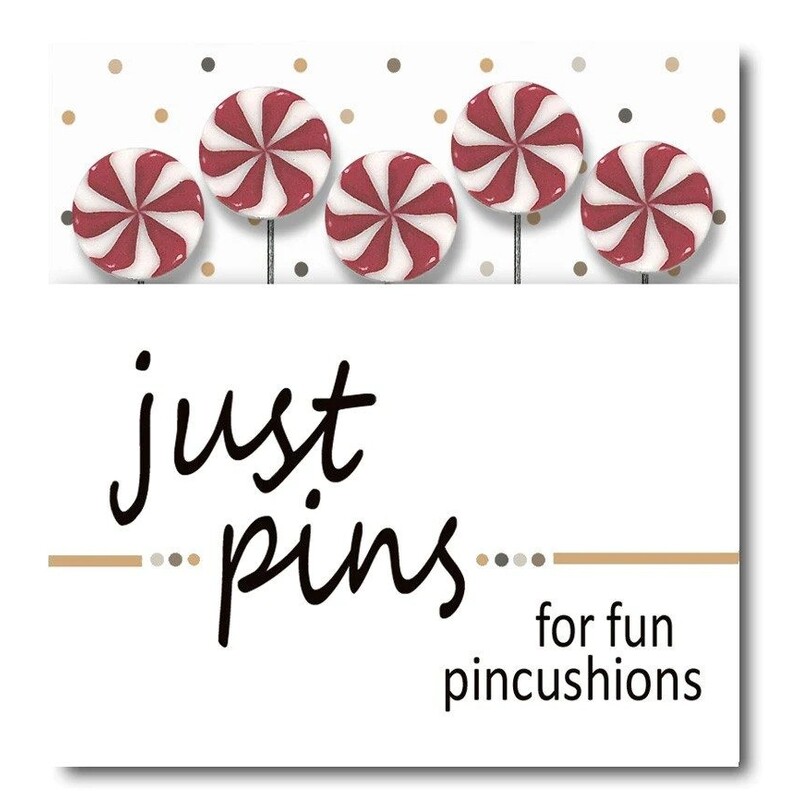 A digital mockup of the packaging for the pins, showing five peppermint swirl candies.