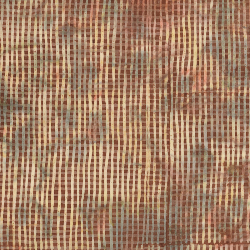 lovely brown batik fabric featuring thin mottled tan, cream, orange, and green plaid stripes