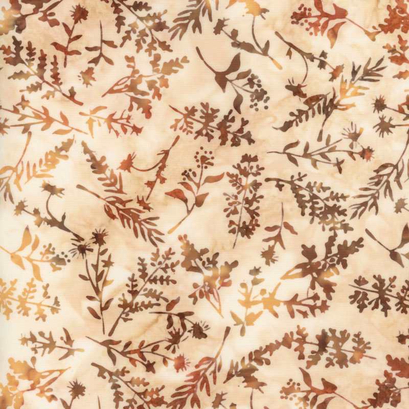 beautiful cream mottled batik fabric featuring scattered brown mottled leaf sprigs