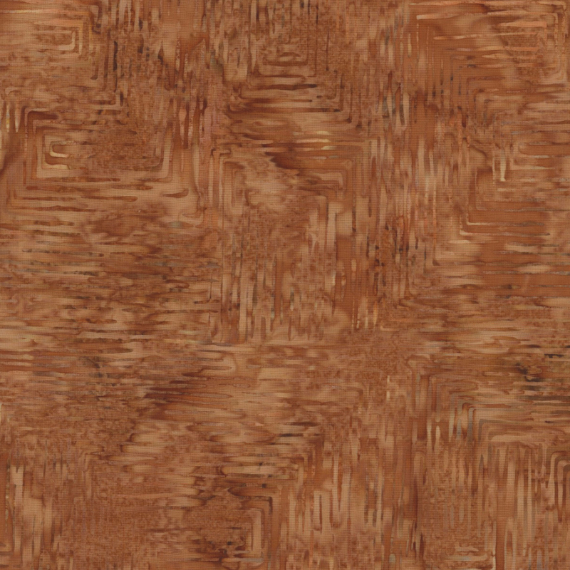lovely light brown mottled batik fabric featuring a thin tan mottled maze of lines in a rectangular pattern