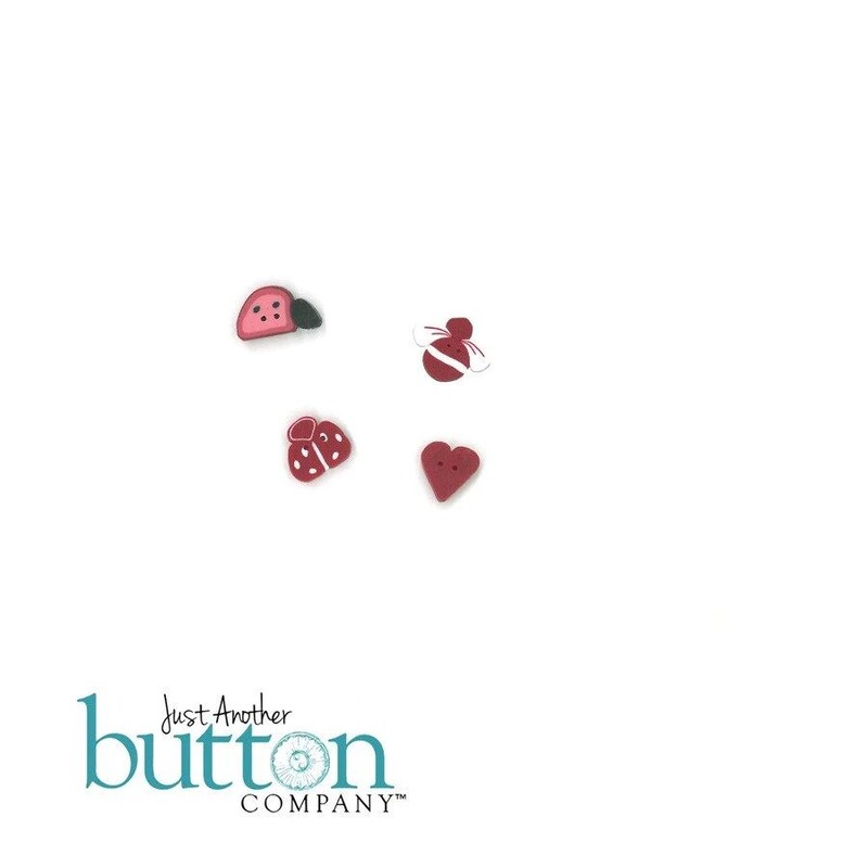 The buttons included in the pack, isolated on a white background.