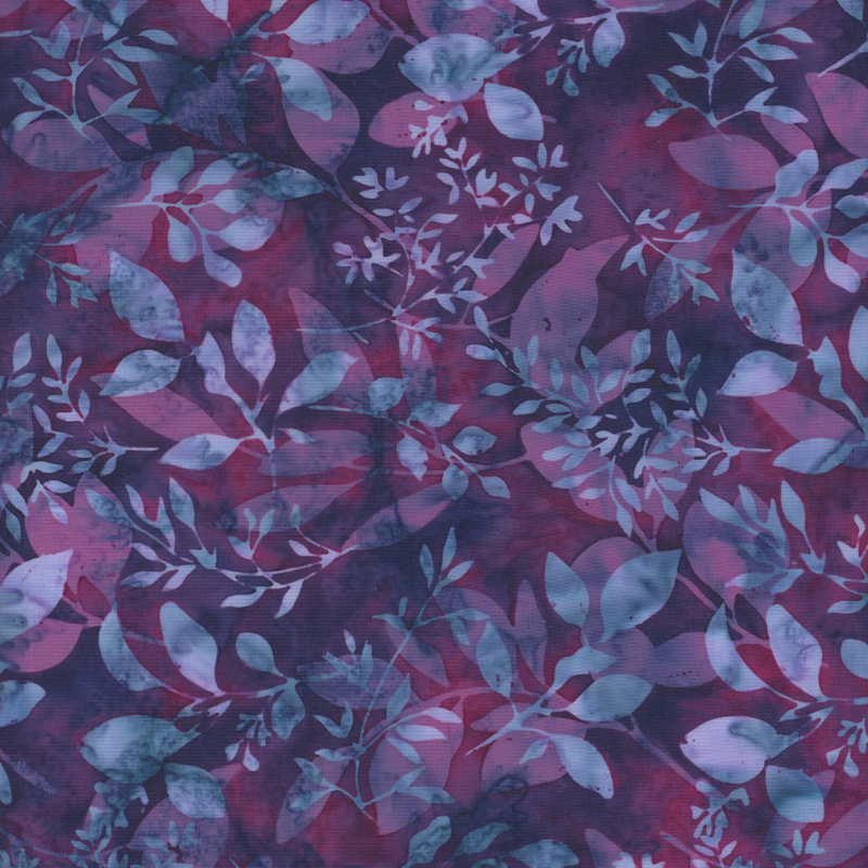 gorgeous purple and violet mottled batik fabric featuring overlapping purple and blue mottled leaf sprigs