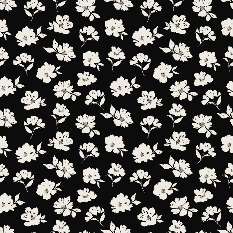 Black fabric patterned with small white florals with gray accents.