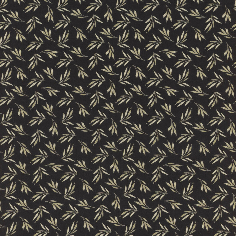 Black fabric patterned with small cream-colored leaflets.