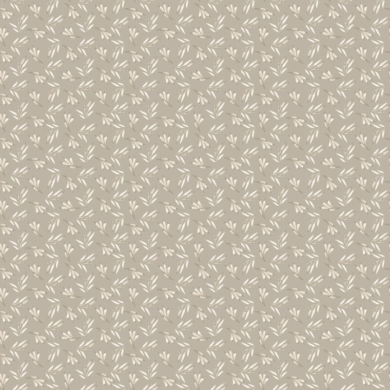 Taupe fabric patterned with small cream-colored leaflets.