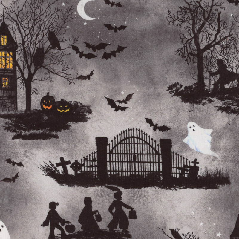Mottled gray fabric with scenes of haunted houses, witches, bats, and pumpkins.