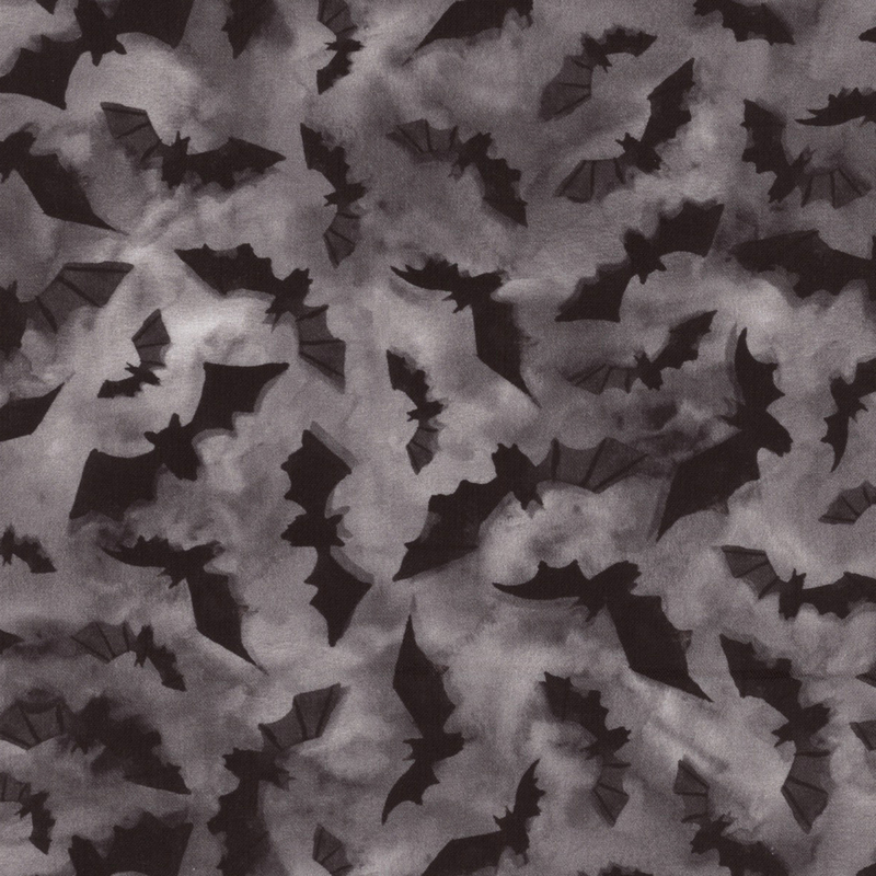 Mottled gray fabric with little black bats all over.