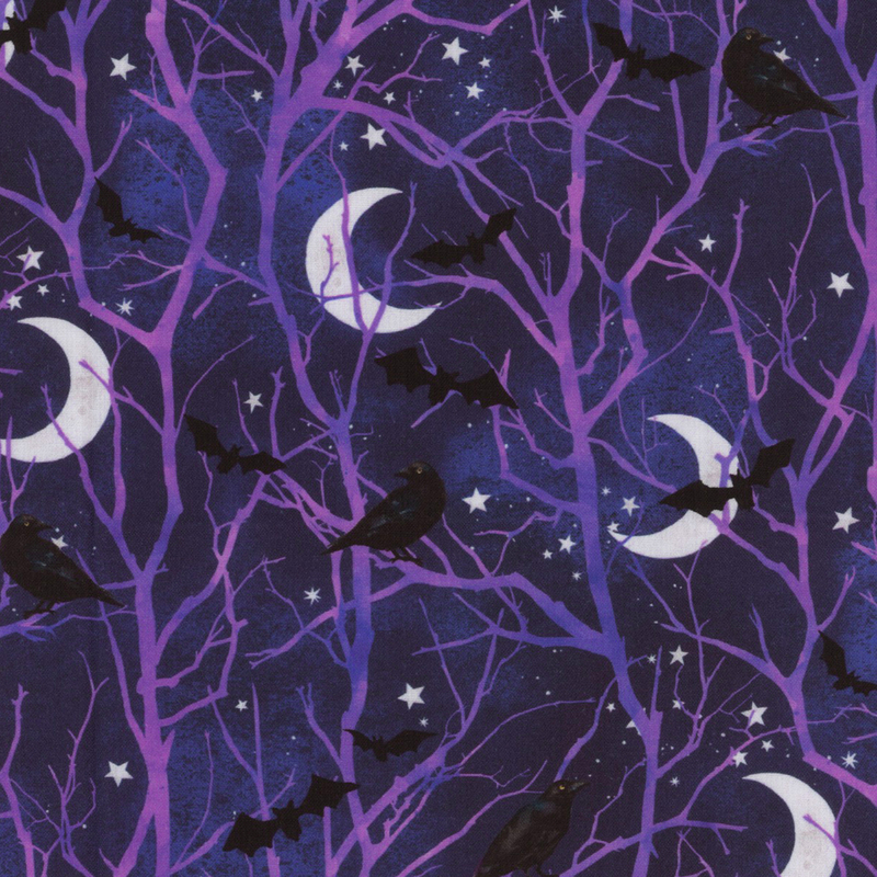Mottled purple fabric with bare tree branches with little black bats, crows, crescent moons, and stars.