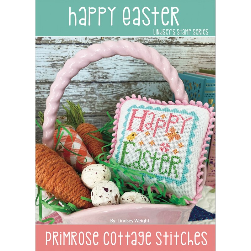 Cover of the Happy Easter pattern, showing the completed project tucked into a pink easter basket with craft carrots and craft bird eggs.