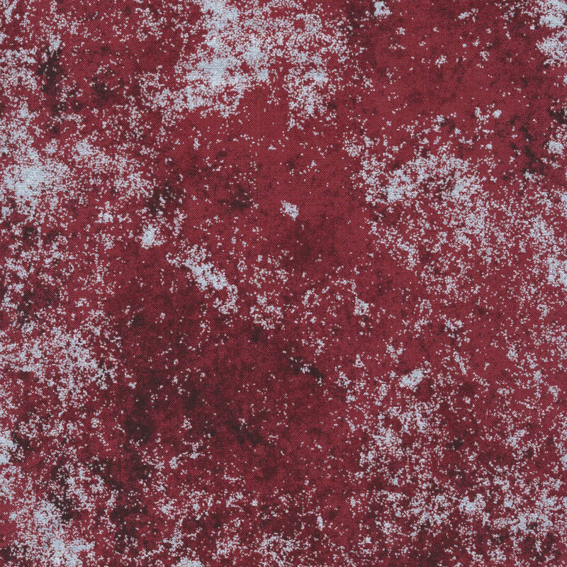 Burgundy red fabric mottled with metallic silver accents.