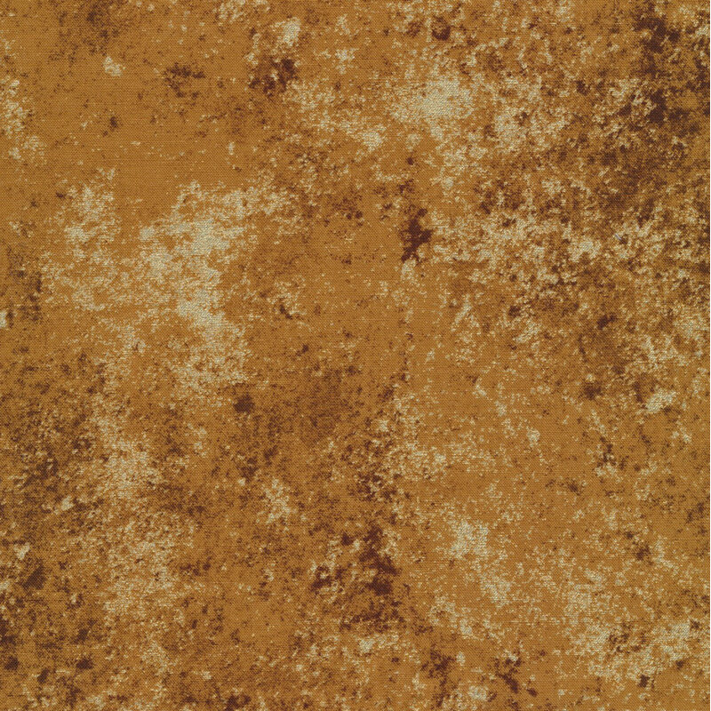 Earthy brown fabric mottled with metallic gold accents.