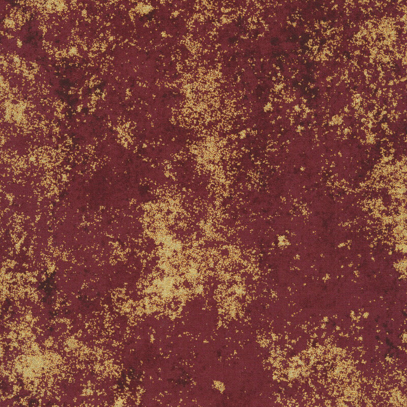 Crimson red fabric mottled with metallic gold accents.