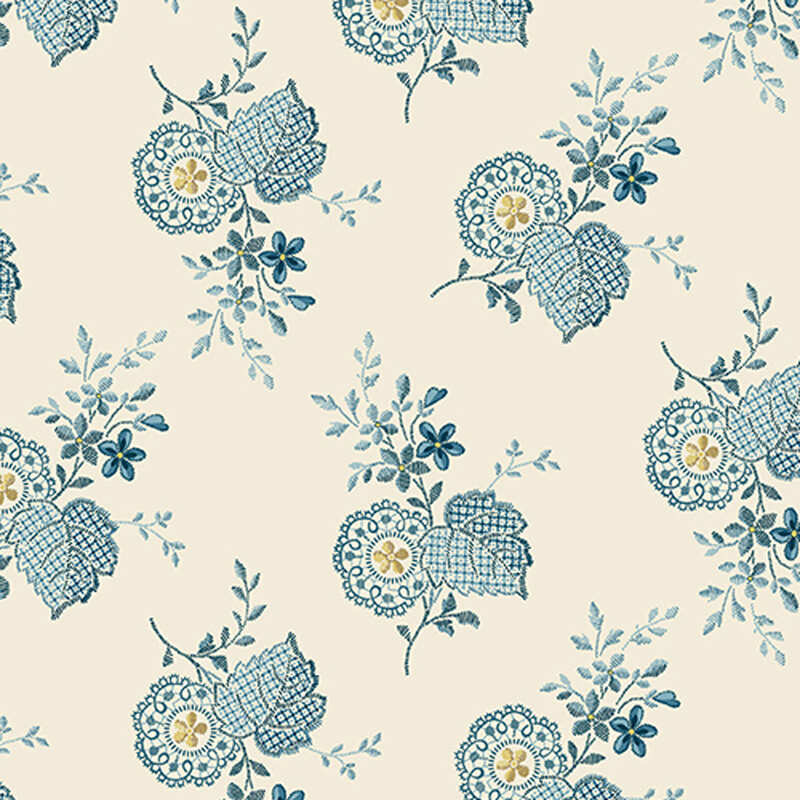 Cream-colored fabric featuring blue and white paisley flowers with yellow accents.