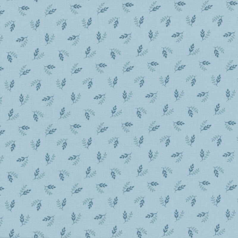Light blue fabric with small blue and navy leaflets.