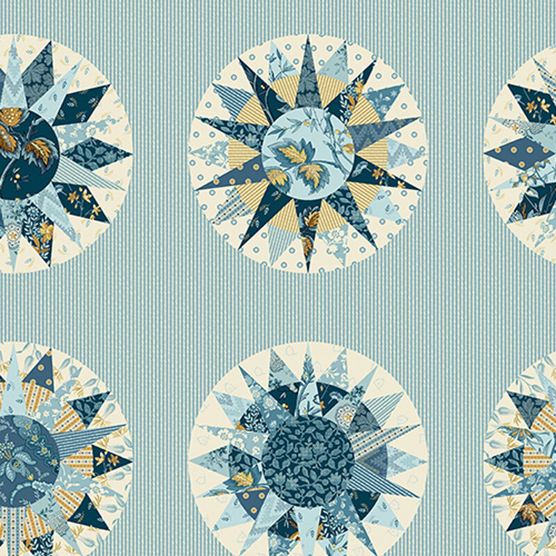 Patchwork compasses including all the fabrics included in the Beach House collection on a blue and cream striped background.