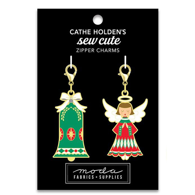 Image of a black tag with 2 Christmas themed zipper pulls of a Bell & Angel