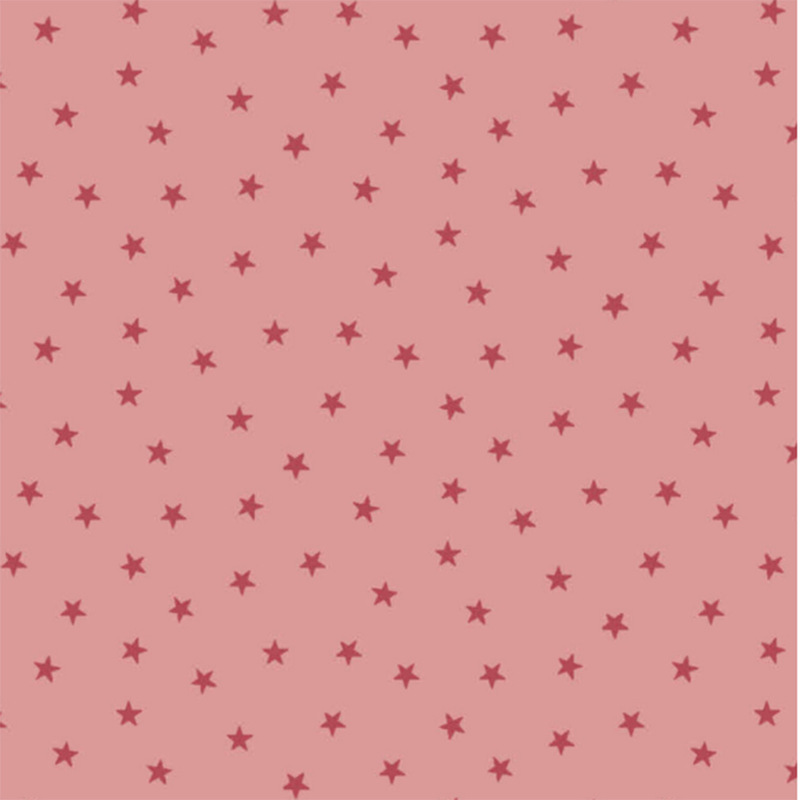 Baby pink fabric with a pattern of tiny stars in a row