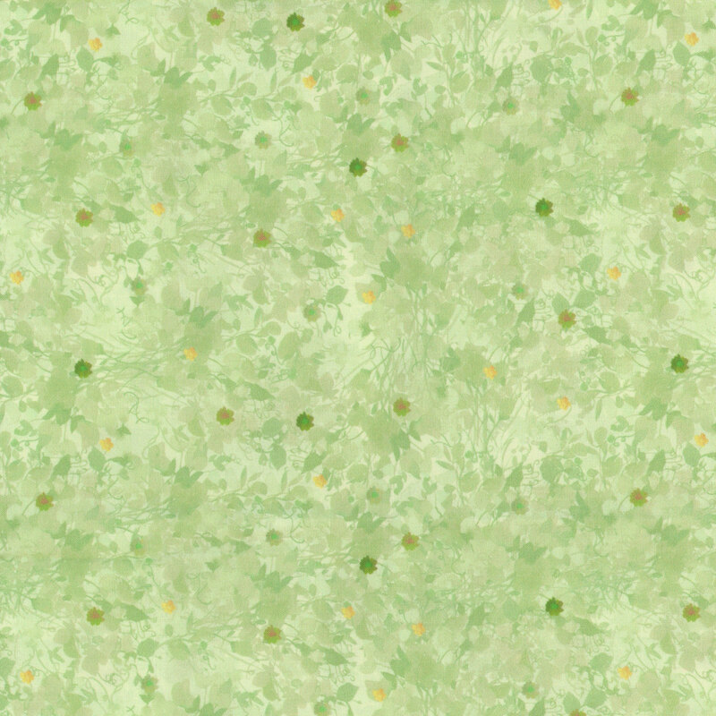 Light green fabric with green leaves and tiny yellow flower details.