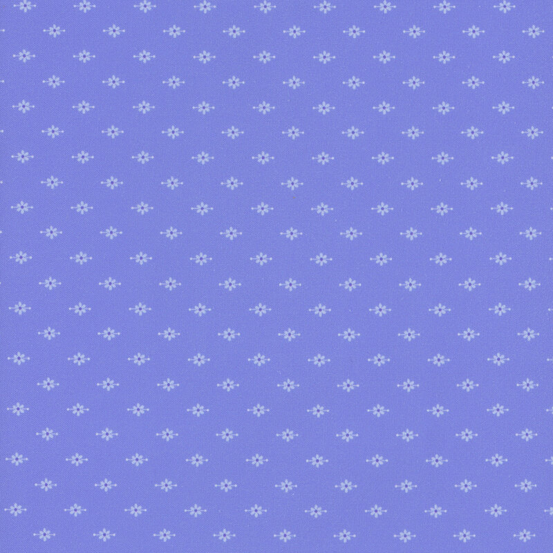 Periwinkle fabric featuring small flower motifs