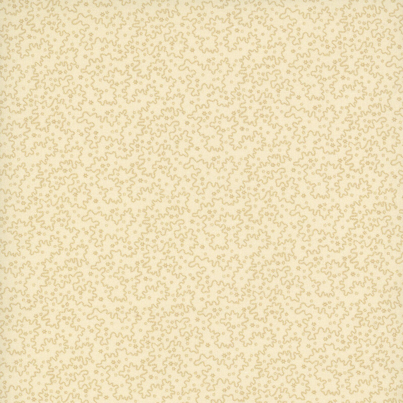 Tonal cream fabric covered in wiggly lines, dots, and hatch marks