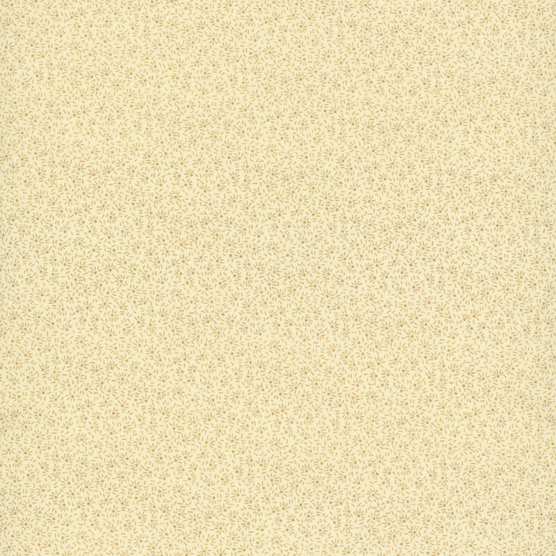 cream fabric with tiny tonal dots and lines in burst-like patterns all over.