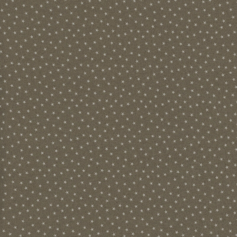 gray fabric with a pattern of tiny stars in a row
