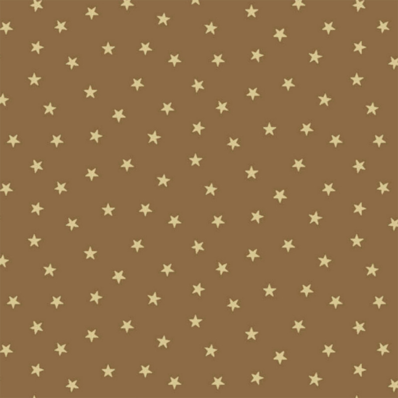 Peanut brown fabric with a pattern of tiny stars in a row
