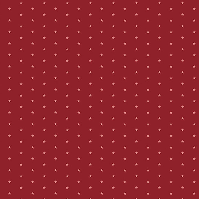 Ruby red fabric with a pattern of tiny stars in a row
