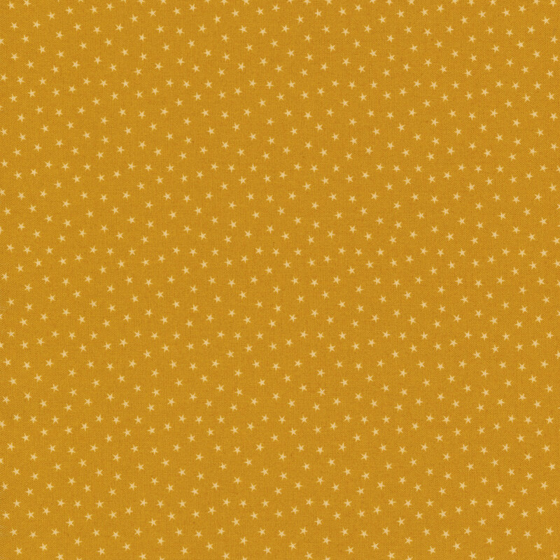 Golden Yellow fabric with a pattern of tiny stars in a row