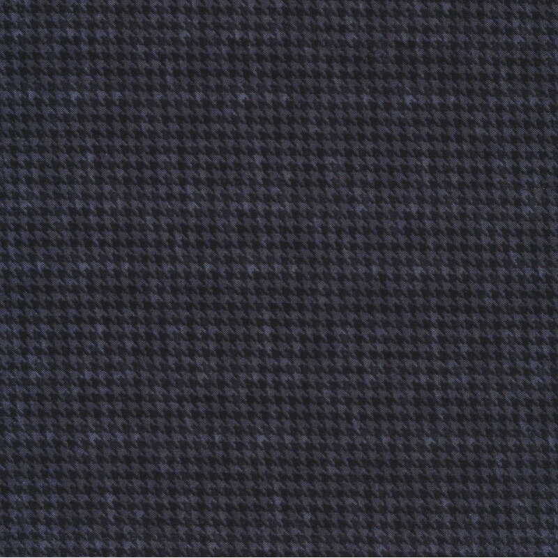 gray and black fabric with a houndstooth pattern