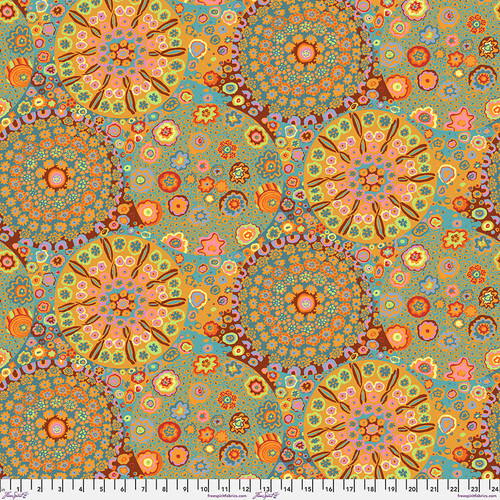 Fabric featuring vibrant multicolor kaleidoscopic abstract designs, gathered into large medallions.