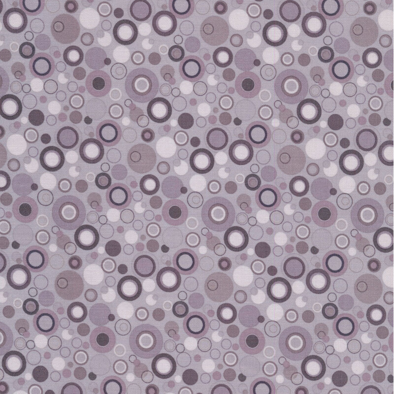 gray fabric with dots that look like bubbles in white, and shades of gray and mauve