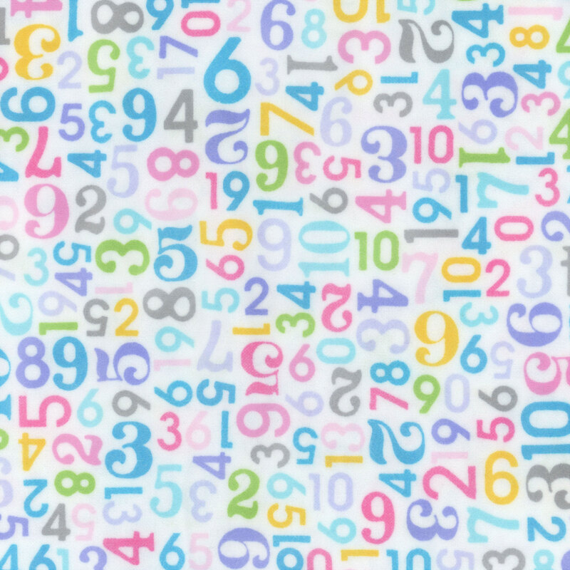 white fabric featuring packed colorful numbers 