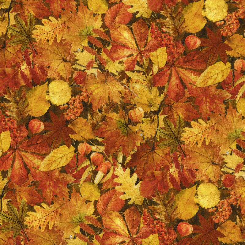Fabric featuring overlapping fall leaves scattered all over, reflect the bright orange, yellow, and fading tinges of green.