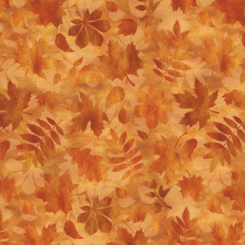Fabric featuring a tonal print of mottled orange and rust colors with leafy shadows tossed all over
