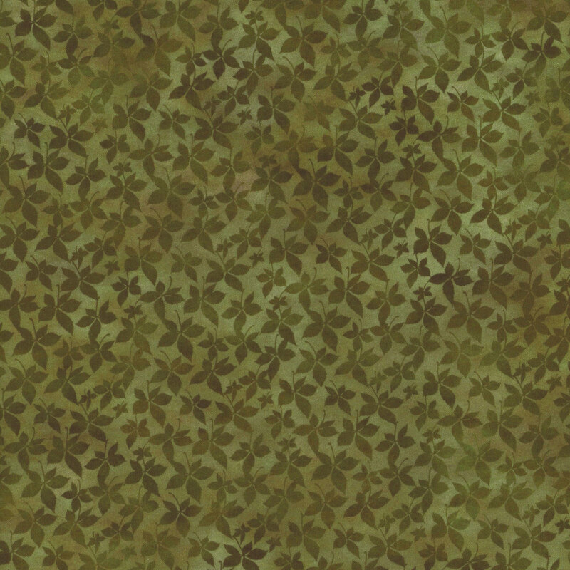 Embrace the spirit of fall with this beautiful tonal print of mottled green with small leafy shadows arranged all over.