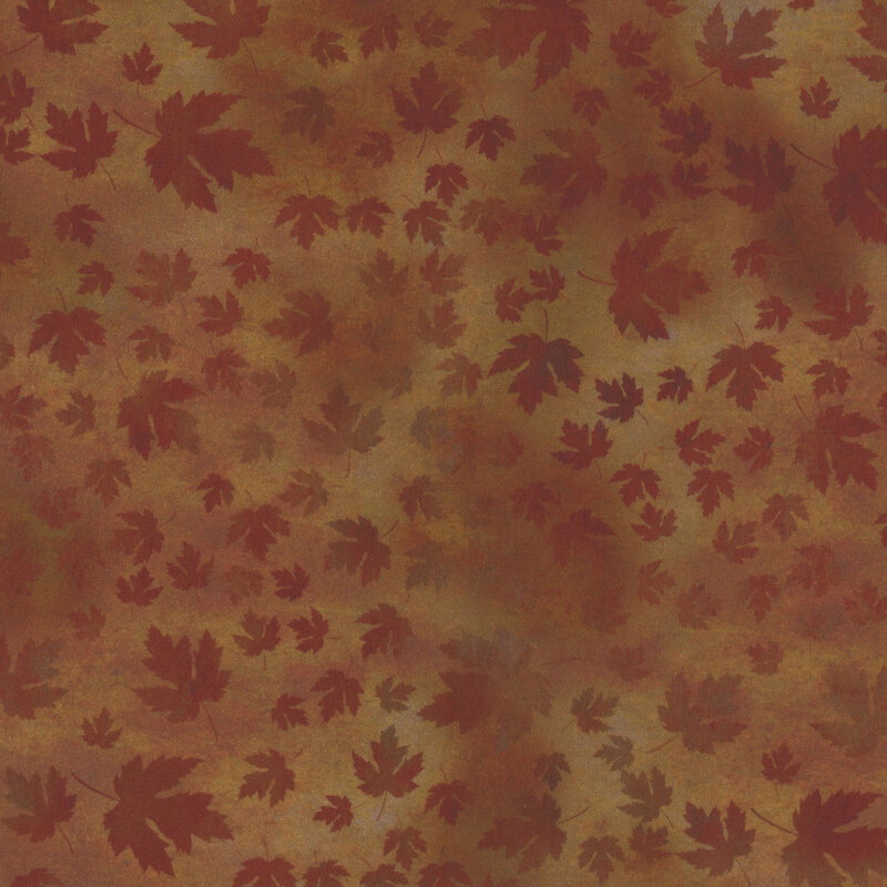 This fabric features brown tonal leaves mottled with the rich brown background.