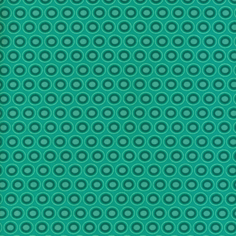 Turquoise fabric with a lovely teal and sea foam oval polka dot design