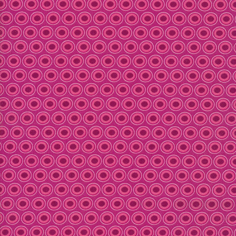 Magenta fabric with a lovely pink and purple oval polka dot design