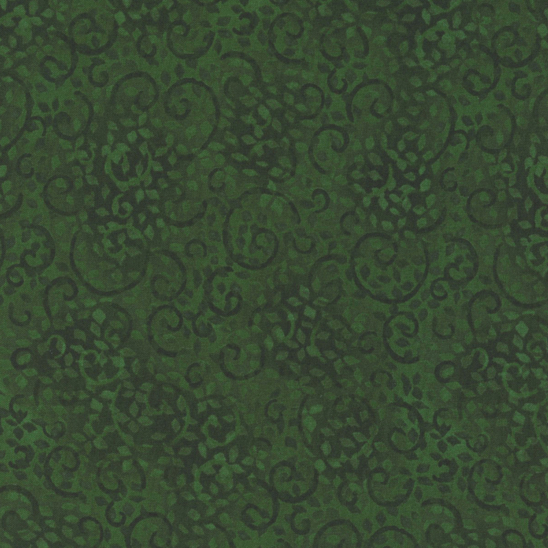 fabric featuring a forest green pattern of scattered leaf and swirl motifs on a mottled green background