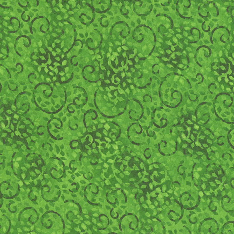 fabric featuring a vibrant green pattern of scattered leaf and swirl motifs on a mottled green background