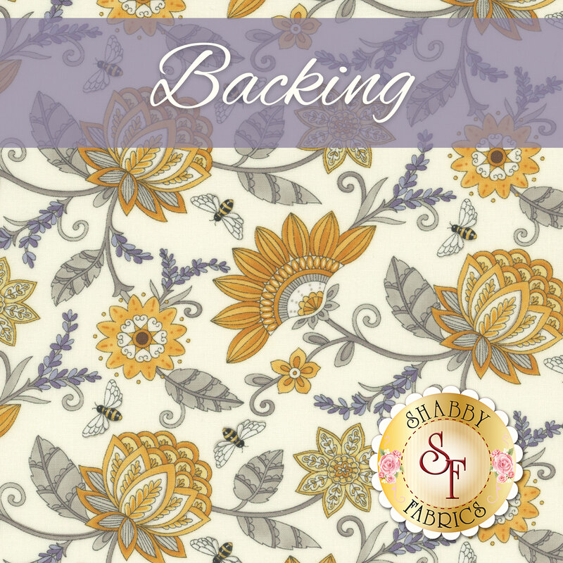 A cream fabric with golden yellow flowers, purple sprigs of lavender, and tossed bees. A muted purple banner reads 
