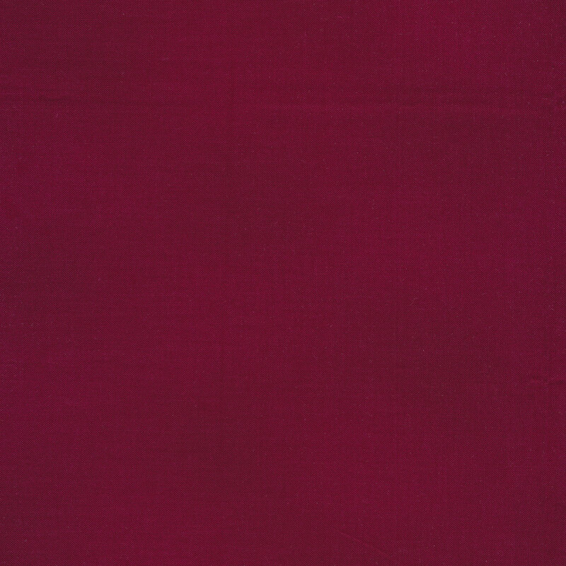 dark burgundy mottled fabric