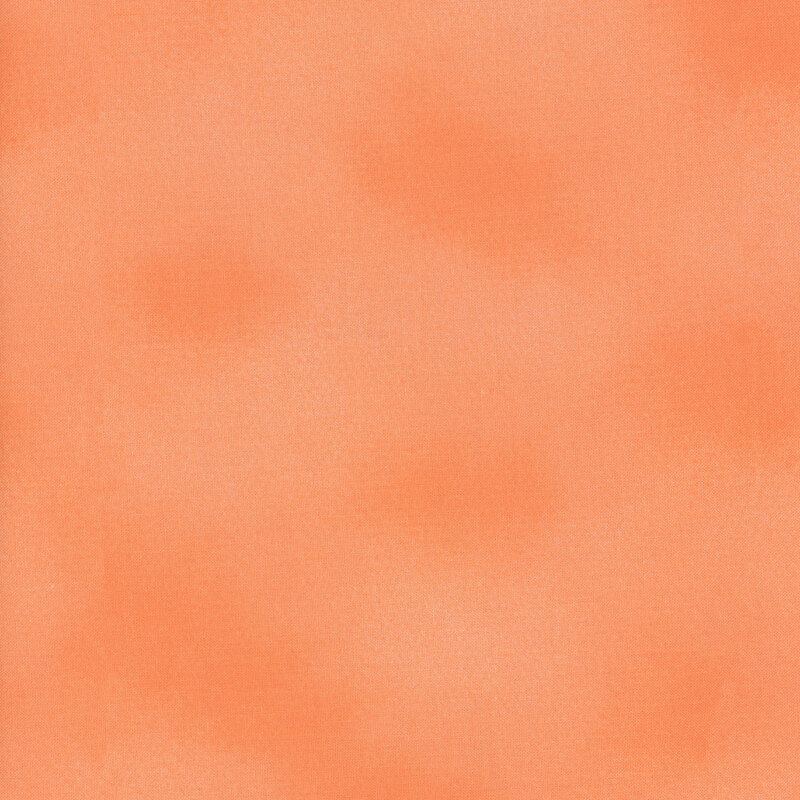 mottled peachy colored fabric